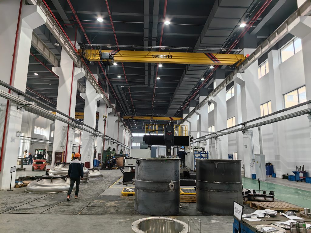 Henan Mine Crane electric single-girder overhead crane serving a clean industrial manufacturing workshop
