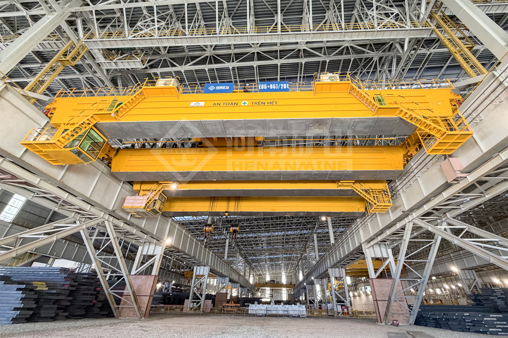 Henan Mine Crane severe-duty double-girder overhead cranes operating in a steel mill production bay